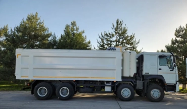 Продам, Самосвал HOWO 8x4 CNG - 31 т / 22 куб.м