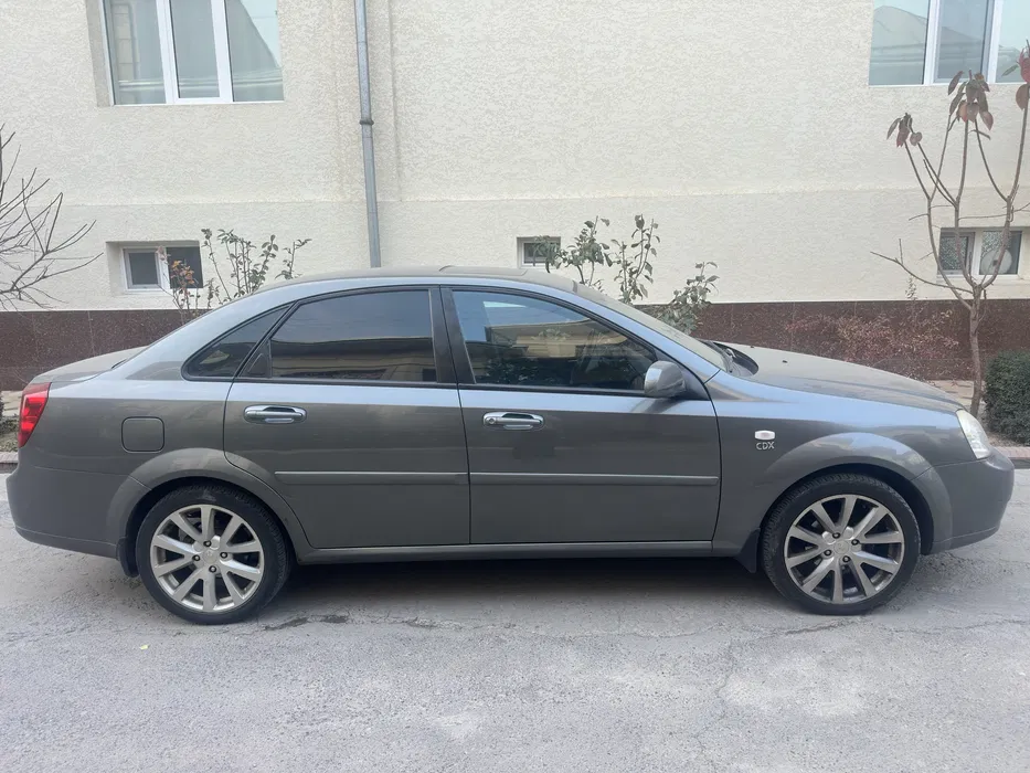 Lacetti mokriy asfalt 1,6 motor 2013-yil mashina